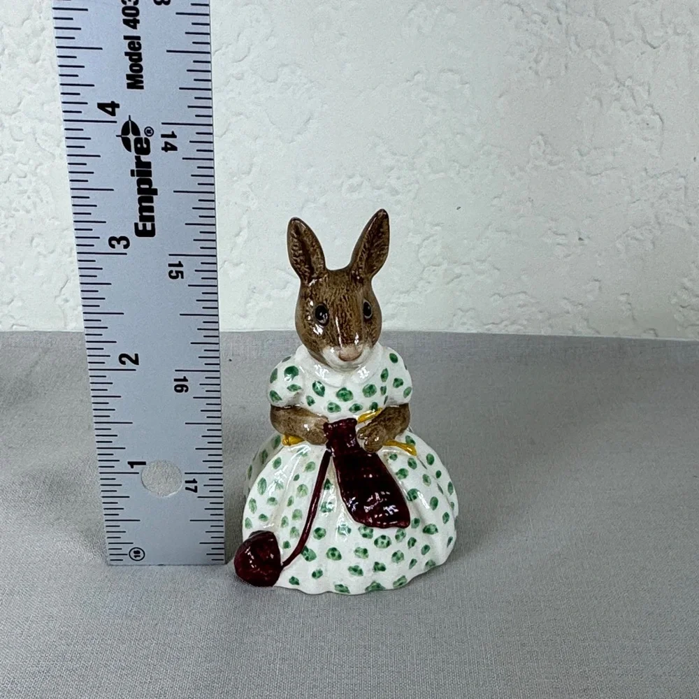 Brown Bunny Figurine in White Dress with Green Polka Dots and Maroon Accessory‎